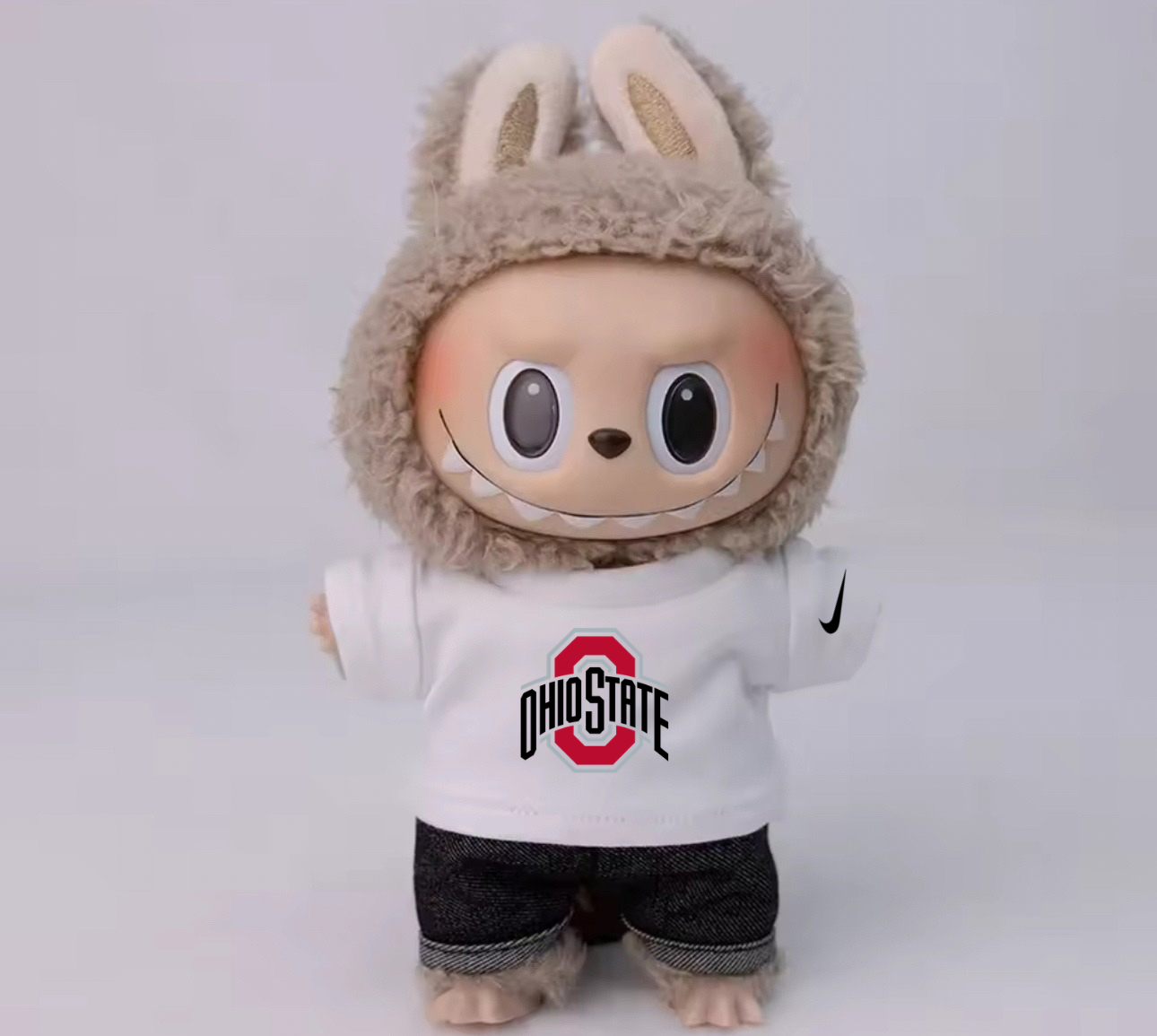 Inspired by Nike NCAA University Teams Collection - Labubu T-shirt by ZOZO & CO